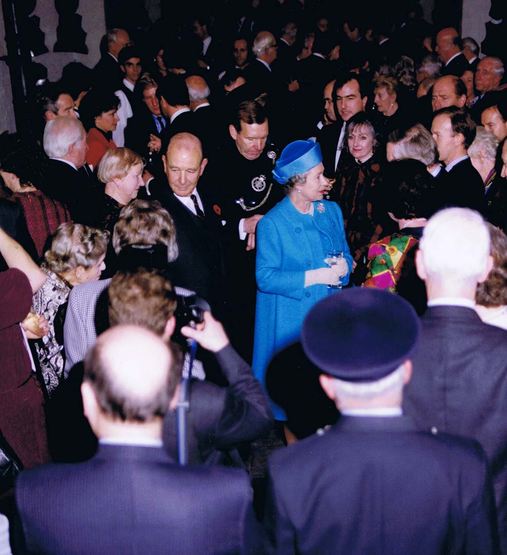 Her Majesty, accompanied by the Association Chairman, Brigadier Gil Hickey, and the Colonel of the Regiment, Major General RA Pett, talking to Members at the 175th Anniversary reception in the Tower of London, 1992